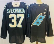Men's NHL Carolina Hurricanes #37 Andrei Svechnikov 2022 Black Warm-Up Adidas Jersey