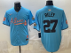 Men's Atlanta Braves #27 Austin Riley Blue 2024 Atliens & Peach With Outkast Patch Vapor Limited Jersey